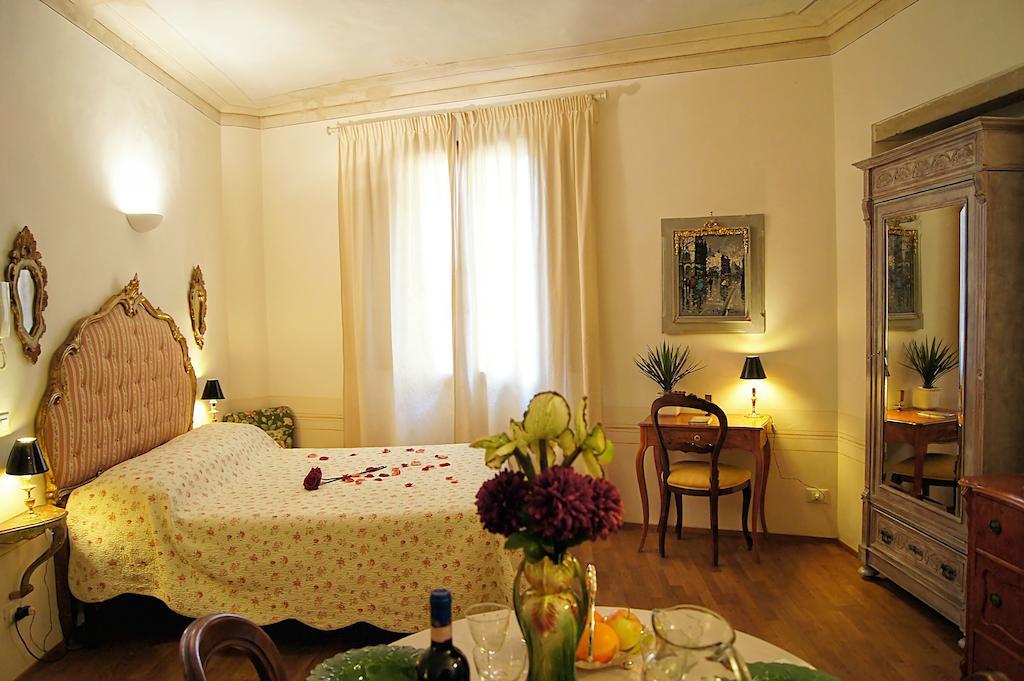 Melarancio Apartments Florencia Habitación foto