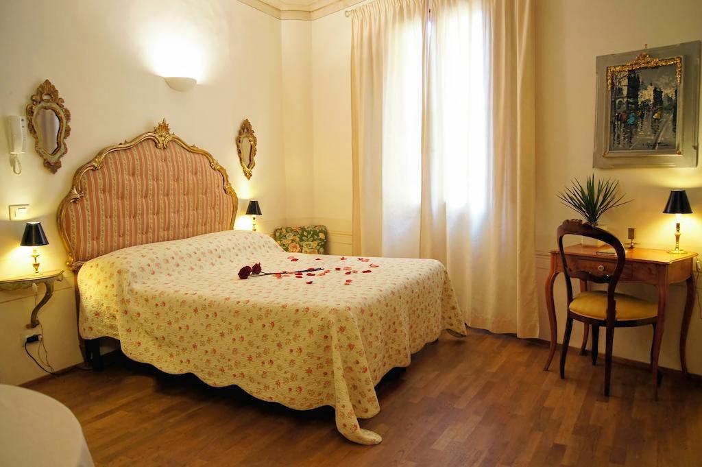 Melarancio Apartments Florencia Habitación foto